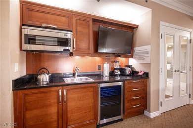 Panoramic Strip View Suite with balcony offering breathtaking on The Wynn Golf Club in Nevada - for sale on GolfHomes.com, golf home, golf lot