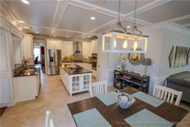 Welcome to this stunning 4 bed, 4 full bath custom home in the on Gates Four Golf and Country Club in North Carolina - for sale on GolfHomes.com, golf home, golf lot