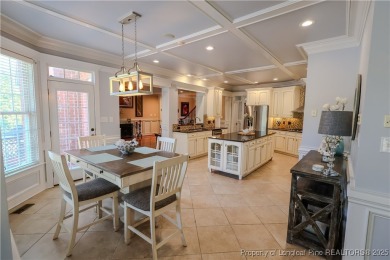 Welcome to this stunning 4 bed, 4 full bath custom home in the on Gates Four Golf and Country Club in North Carolina - for sale on GolfHomes.com, golf home, golf lot