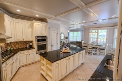 Welcome to this stunning 4 bed, 4 full bath custom home in the on Gates Four Golf and Country Club in North Carolina - for sale on GolfHomes.com, golf home, golf lot