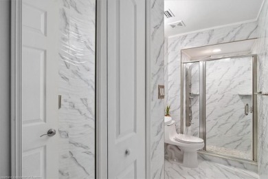 Welcome to this beautifully renovated 1-bedroom, 2-full-bathroom on Sun n Lake Golf and Country Club in Florida - for sale on GolfHomes.com, golf home, golf lot