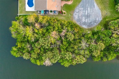 Ready to build on waterfront 0.30 acre lot featuring a fully on Palm Harbor Golf Club in Florida - for sale on GolfHomes.com, golf home, golf lot