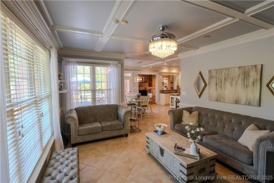 Welcome to this stunning 4 bed, 4 full bath custom home in the on Gates Four Golf and Country Club in North Carolina - for sale on GolfHomes.com, golf home, golf lot