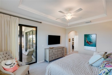 Arrive by PRIVATE ELEVATOR and step into a home that immediately on Pelican Preserve Golf Club in Florida - for sale on GolfHomes.com, golf home, golf lot