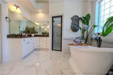 Welcome to this stunning 4 bed, 4 full bath custom home in the on Gates Four Golf and Country Club in North Carolina - for sale on GolfHomes.com, golf home, golf lot