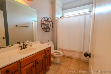 Welcome to this stunning 4 bed, 4 full bath custom home in the on Gates Four Golf and Country Club in North Carolina - for sale on GolfHomes.com, golf home, golf lot