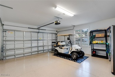 Arrive by PRIVATE ELEVATOR and step into a home that immediately on Pelican Preserve Golf Club in Florida - for sale on GolfHomes.com, golf home, golf lot