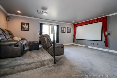 Welcome to this stunning 4 bed, 4 full bath custom home in the on Gates Four Golf and Country Club in North Carolina - for sale on GolfHomes.com, golf home, golf lot