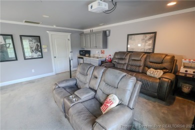 Welcome to this stunning 4 bed, 4 full bath custom home in the on Gates Four Golf and Country Club in North Carolina - for sale on GolfHomes.com, golf home, golf lot