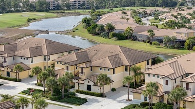 Arrive by PRIVATE ELEVATOR and step into a home that immediately on Pelican Preserve Golf Club in Florida - for sale on GolfHomes.com, golf home, golf lot