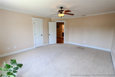 Welcome to this stunning 4 bed, 4 full bath custom home in the on Gates Four Golf and Country Club in North Carolina - for sale on GolfHomes.com, golf home, golf lot