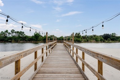 Arrive by PRIVATE ELEVATOR and step into a home that immediately on Pelican Preserve Golf Club in Florida - for sale on GolfHomes.com, golf home, golf lot