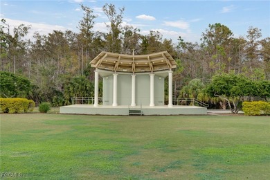 Arrive by PRIVATE ELEVATOR and step into a home that immediately on Pelican Preserve Golf Club in Florida - for sale on GolfHomes.com, golf home, golf lot