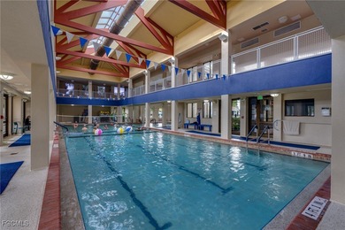 Arrive by PRIVATE ELEVATOR and step into a home that immediately on Pelican Preserve Golf Club in Florida - for sale on GolfHomes.com, golf home, golf lot