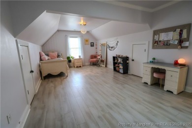 Welcome to this stunning 4 bed, 4 full bath custom home in the on Gates Four Golf and Country Club in North Carolina - for sale on GolfHomes.com, golf home, golf lot