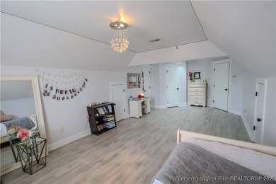 Welcome to this stunning 4 bed, 4 full bath custom home in the on Gates Four Golf and Country Club in North Carolina - for sale on GolfHomes.com, golf home, golf lot