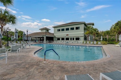Arrive by PRIVATE ELEVATOR and step into a home that immediately on Pelican Preserve Golf Club in Florida - for sale on GolfHomes.com, golf home, golf lot