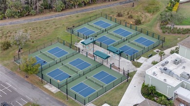 Arrive by PRIVATE ELEVATOR and step into a home that immediately on Pelican Preserve Golf Club in Florida - for sale on GolfHomes.com, golf home, golf lot