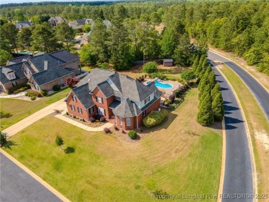 Welcome to this stunning 4 bed, 4 full bath custom home in the on Gates Four Golf and Country Club in North Carolina - for sale on GolfHomes.com, golf home, golf lot