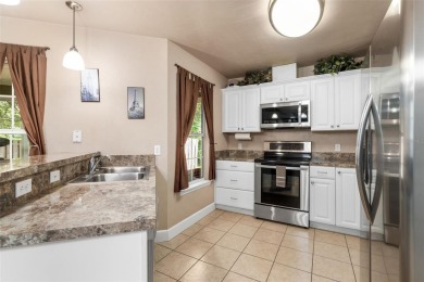 Welcome to the only two-story home in the gated Creekside Villas on Turkey Creek Golf and Country Club in Florida - for sale on GolfHomes.com, golf home, golf lot