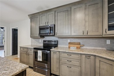 Experience resort-style living every day in this all-brick on Fairfield Plantation Golf and Country Club in Georgia - for sale on GolfHomes.com, golf home, golf lot