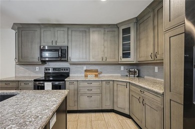 Experience resort-style living every day in this all-brick on Fairfield Plantation Golf and Country Club in Georgia - for sale on GolfHomes.com, golf home, golf lot