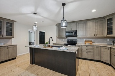 Experience resort-style living every day in this all-brick on Fairfield Plantation Golf and Country Club in Georgia - for sale on GolfHomes.com, golf home, golf lot