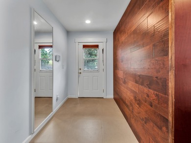 Tucked away on a quiet cul-de-sac, is a beautiful two story home on Discovery Harbour Golf Course in Hawaii - for sale on GolfHomes.com, golf home, golf lot