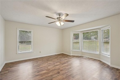 Experience resort-style living every day in this all-brick on Fairfield Plantation Golf and Country Club in Georgia - for sale on GolfHomes.com, golf home, golf lot