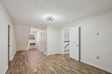 Experience resort-style living every day in this all-brick on Fairfield Plantation Golf and Country Club in Georgia - for sale on GolfHomes.com, golf home, golf lot