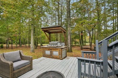 Experience resort-style living every day in this all-brick on Fairfield Plantation Golf and Country Club in Georgia - for sale on GolfHomes.com, golf home, golf lot