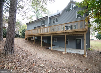Renovations are complete! This huge home comes complete with a on Brookstone Golf and Country Club in Georgia - for sale on GolfHomes.com, golf home, golf lot