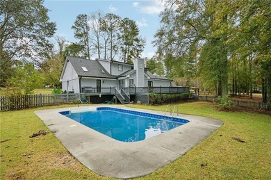 Experience resort-style living every day in this all-brick on Fairfield Plantation Golf and Country Club in Georgia - for sale on GolfHomes.com, golf home, golf lot