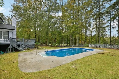 Experience resort-style living every day in this all-brick on Fairfield Plantation Golf and Country Club in Georgia - for sale on GolfHomes.com, golf home, golf lot