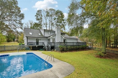 Experience resort-style living every day in this all-brick on Fairfield Plantation Golf and Country Club in Georgia - for sale on GolfHomes.com, golf home, golf lot