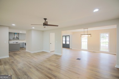 Renovations are complete! This huge home comes complete with a on Brookstone Golf and Country Club in Georgia - for sale on GolfHomes.com, golf home, golf lot