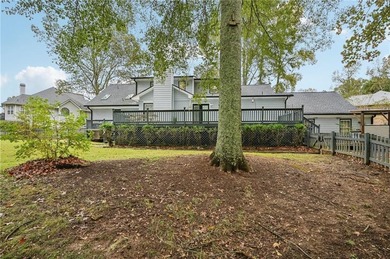 Experience resort-style living every day in this all-brick on Fairfield Plantation Golf and Country Club in Georgia - for sale on GolfHomes.com, golf home, golf lot