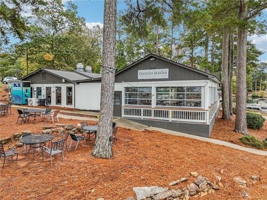 Experience resort-style living every day in this all-brick on Fairfield Plantation Golf and Country Club in Georgia - for sale on GolfHomes.com, golf home, golf lot