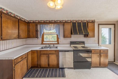 Introducing a charming 3-bedroom, 2-bathroom salt box style on Rockland Golf Club, Inc. in Maine - for sale on GolfHomes.com, golf home, golf lot