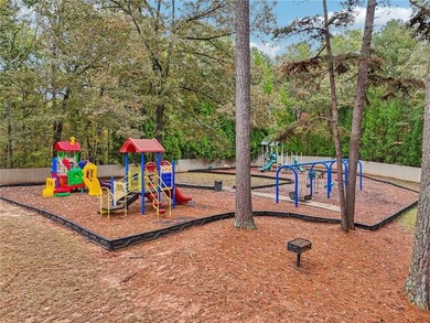 Experience resort-style living every day in this all-brick on Fairfield Plantation Golf and Country Club in Georgia - for sale on GolfHomes.com, golf home, golf lot