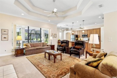 Stunning Amelia National home on a premier lot tucked into a on Amelia National Golf and Country Club in Florida - for sale on GolfHomes.com, golf home, golf lot