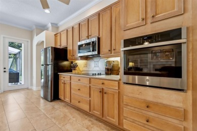Stunning Amelia National home on a premier lot tucked into a on Amelia National Golf and Country Club in Florida - for sale on GolfHomes.com, golf home, golf lot