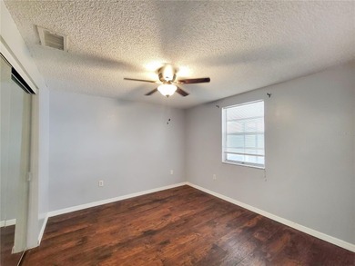 One or more photo(s) has been virtually staged. NO FLOOD on Meadow Oaks Golf and Country Club in Florida - for sale on GolfHomes.com, golf home, golf lot