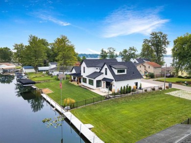 Gorgeous Custom-Built Home on Lake Wawasee Channel - Turnkey on Wawasee Golf Club in Indiana - for sale on GolfHomes.com, golf home, golf lot