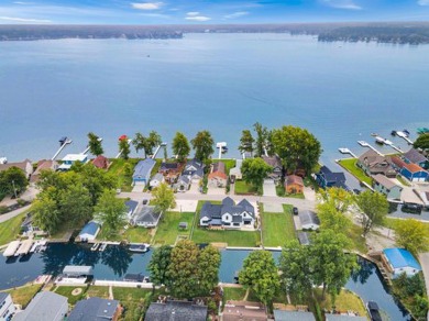 Gorgeous Custom-Built Home on Lake Wawasee Channel - Turnkey on Wawasee Golf Club in Indiana - for sale on GolfHomes.com, golf home, golf lot