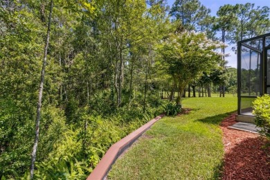 Stunning Amelia National home on a premier lot tucked into a on Amelia National Golf and Country Club in Florida - for sale on GolfHomes.com, golf home, golf lot