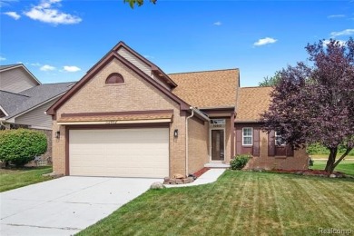 This beautifully updated home on a premium water view lot on Gateway Golf Club in Michigan - for sale on GolfHomes.com, golf home, golf lot