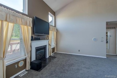 This beautifully updated home on a premium water view lot on Gateway Golf Club in Michigan - for sale on GolfHomes.com, golf home, golf lot
