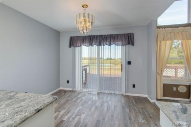 This beautifully updated home on a premium water view lot on Gateway Golf Club in Michigan - for sale on GolfHomes.com, golf home, golf lot