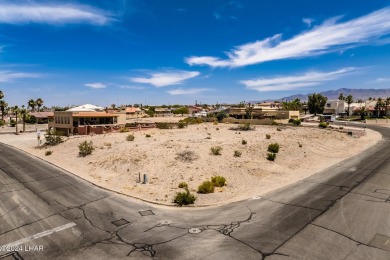 This remarkable corner lot boasts a captivating view of a on London Bridge Golf Course in Arizona - for sale on GolfHomes.com, golf home, golf lot